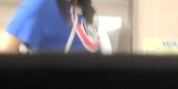 Brunette woman spied in public toilet pissing