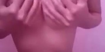Cute asian busty teen teasing her body in schoolgirl skirt