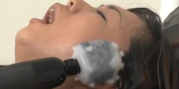 Bound Asian handles sex machines like a trooper