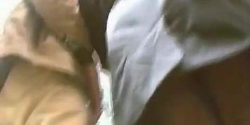 Peek of the ass of a Girl in stockings shopping with hubby