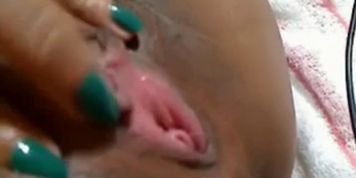 she_fingers_her_pussy_and_sucks_her_long_nipples