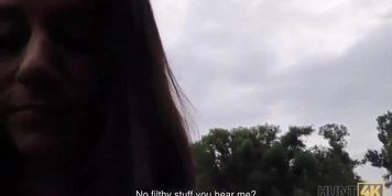 HUNT4K. Outstanding brunette girl gets nailed in the public park