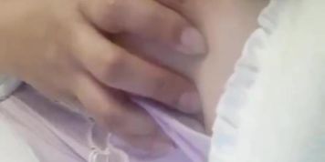 Naughty Asian Milf playing and sucking her boobs in the morning 
