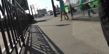 Green dress of the model girl lets enjoy her upskirts