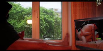 Masturbating by the window while watching porn with hot anal