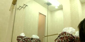 A ballet dancing girl is in the dressing room getting undress to a spy camera