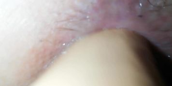 Slimy anal dildo dilatation