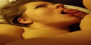 Mouth and pussy fucked by two guys