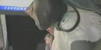 Sexy upskirt of lovely girl whose white skirt reveals ass