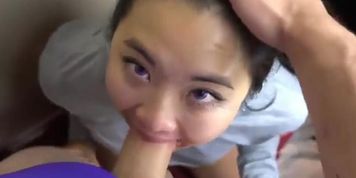Young asian teen gives a face fucking blowjob