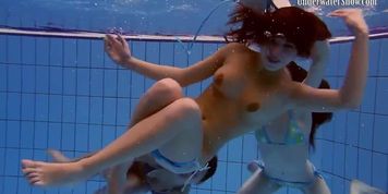 Three girls with Matrosova in swimming pools
