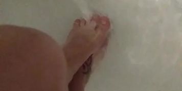 Feet Under Running Water