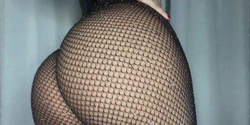 In Black Lingerie and Shiny Fishnet Bodystocking - 