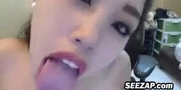hot asian girl inserts massive dildo