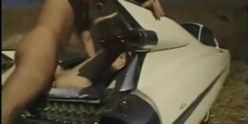 Redhead fucked in a trunk car (name movie or girl?)