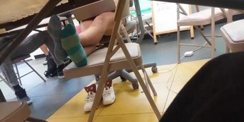 Candid college girl feet out of sneakers 