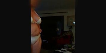 64 YEAR OLD HOTWIFE IN WHITE BIKINI SHOWING OFF TO NEIGHBOR