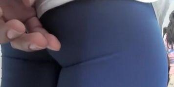 Man gropes woman's nice ass