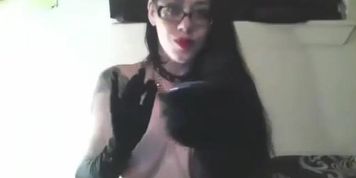 Horny girl gagging on cam