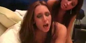 2 Lesbians Having Fun With Strap On