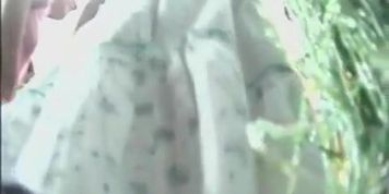 green and white flowery mini skirt upskirt in slow motion