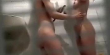 Cute girl taking shower with best friend