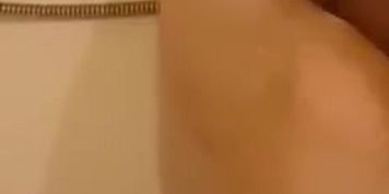 Washing my long slim legs with rough brush totally nacked in bath