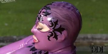 Playful chick masturbates outdoor wearing weird alien costume