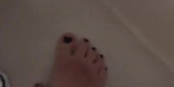 Playing with my feet in the bath tub