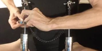 Kinky peehole fucking slut stretching nipples with weights