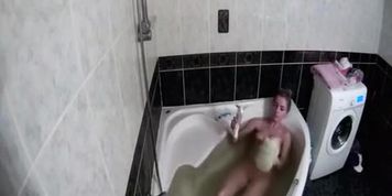 Sexy blonde bath and shaving