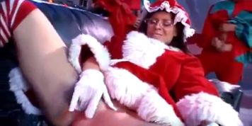 Mrs. Clause get naughty with the elvs