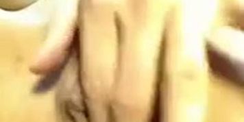 Sexy naughty brunette girl on webcam stretching and shows off her pink pussy