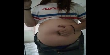 Bbw playing with huge belly while smoking