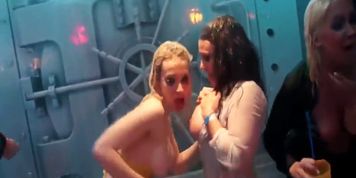 Hot girls dancing erotically in a club