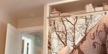 Hot, young mother masturbates in a corset and fishnets for her boyfriend