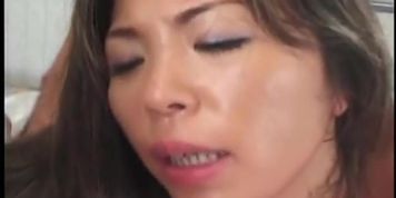 Brunette Asian chick enjoys sweaty sex and hard handling
