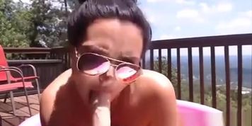 High in Mountains Shea is Having Bath in a Pool on Balcony Outdoorr