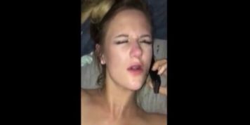 cumming on her face while on the phone