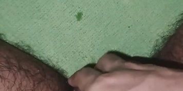 Idiot plays with his dick while watching porn.