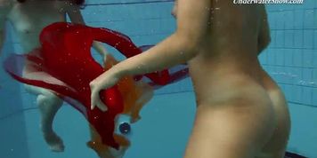 Fedorchuk and Rachinska babes nude underwater lesbos