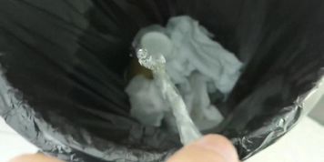 Pissing in bin