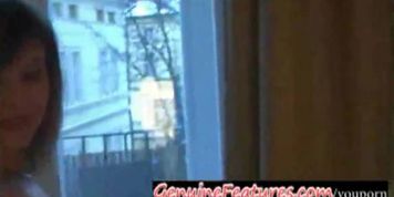 Amateur couple in front of the window