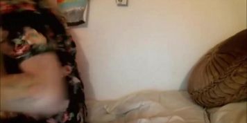 Blonde tranny in red bra moaning during a hot masturbation