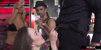 PUBLIC DISGRACE - Public slut squirting in throating orgy in front of voyeurs