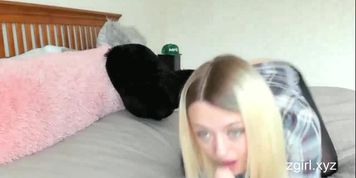Blondie stuffs her shaved little pussy with a huge dildo