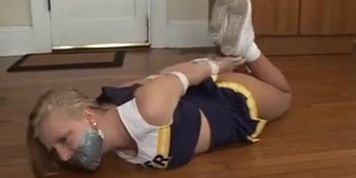 blonde cheerleader hogtied and duct tape gagged