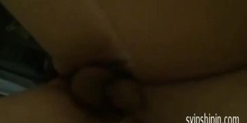 busty Asian in restroom