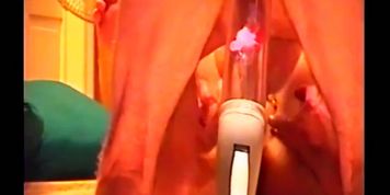 ON HER BACK PLAYING WITH HER PUSSY AND I LICK HER PUSSY