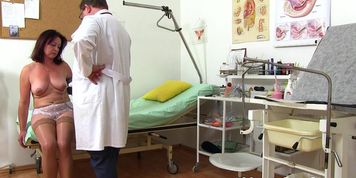 Footage of Mature Woman Gyno Speculum Exam + Vaginal Irrigation